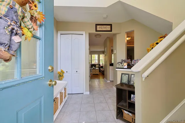 a view of living room with furniture and wooden floor