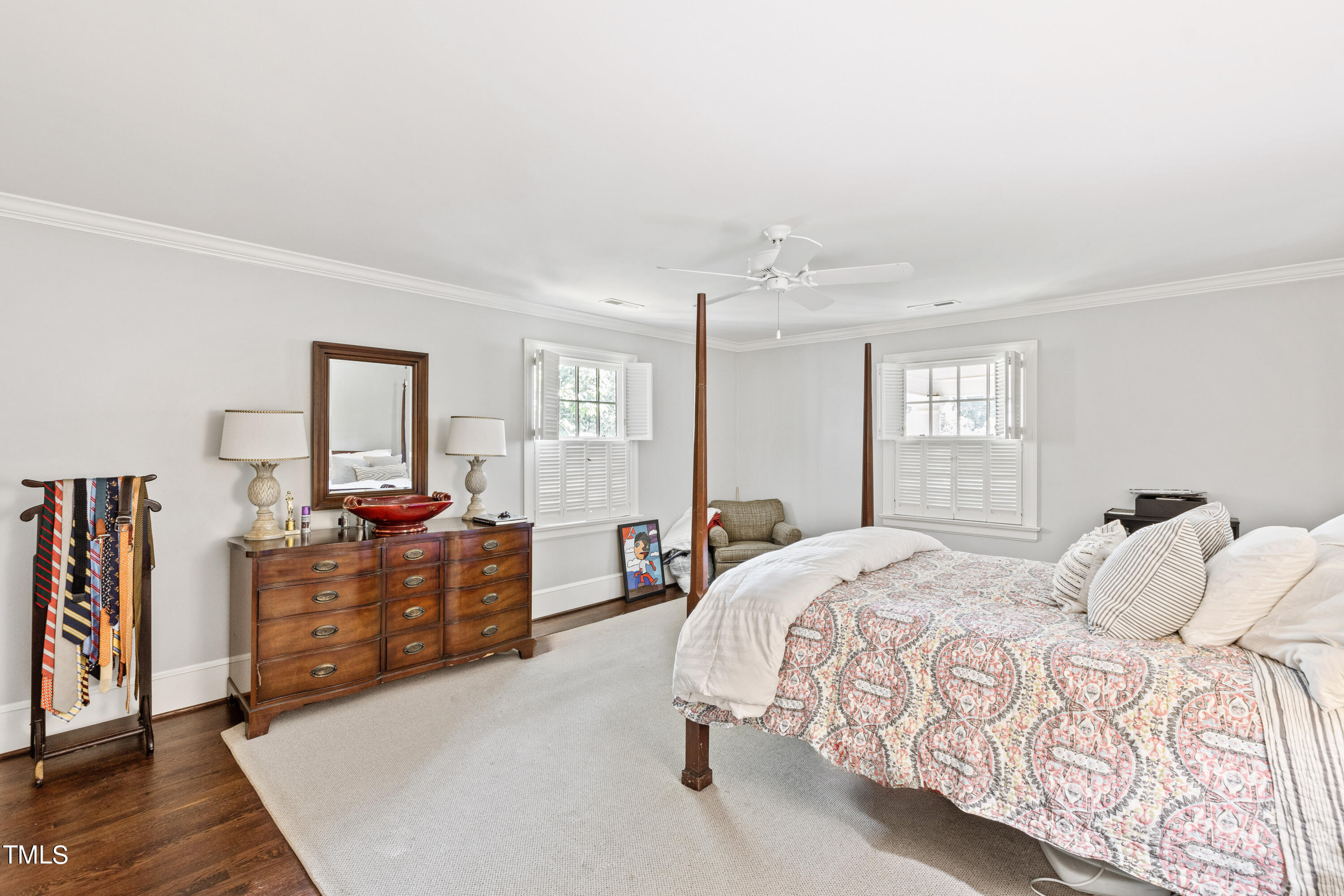 2525 White Oak Road Raleigh, NC 27609 - Photo 31 of 58 a bed room with a bed and a dresser