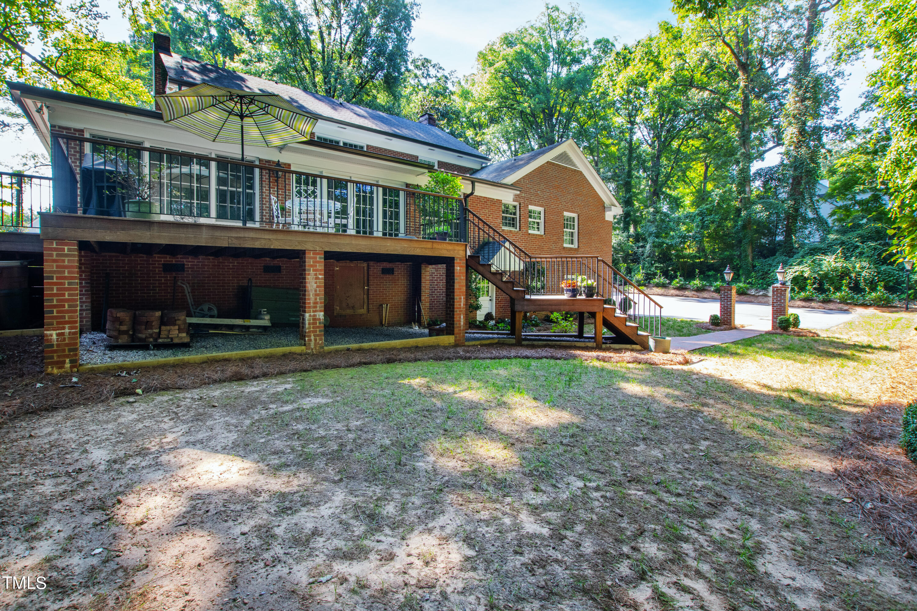 2525 White Oak Road Raleigh, NC 27609 - Photo 46 of 58 a front view of a house with a yard