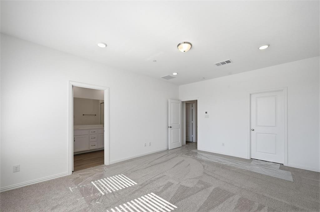 1168 Daybreak Drive, Unit 1168 Allen, TX 75013 - Photo 19 of 25 Spacious room with light gray carpeting, recessed lighting, and a surface-mounted ceiling light fixture