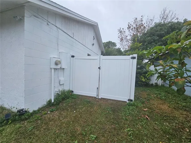 a view of a house with swimming pool