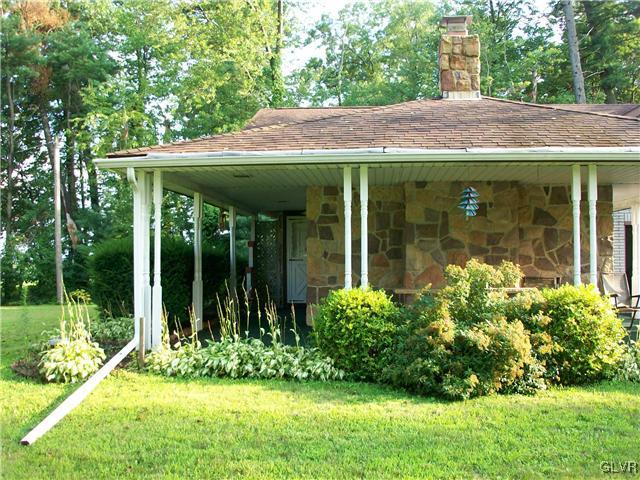 504 West Moorestown Road Nazareth, PA 18064 - Photo 3 of 5 a view of a house with garden and plants