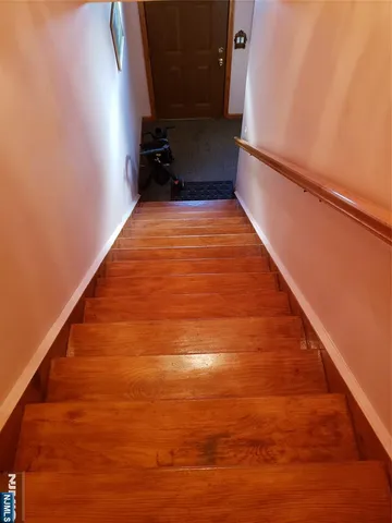 a view of balcony with wooden floor