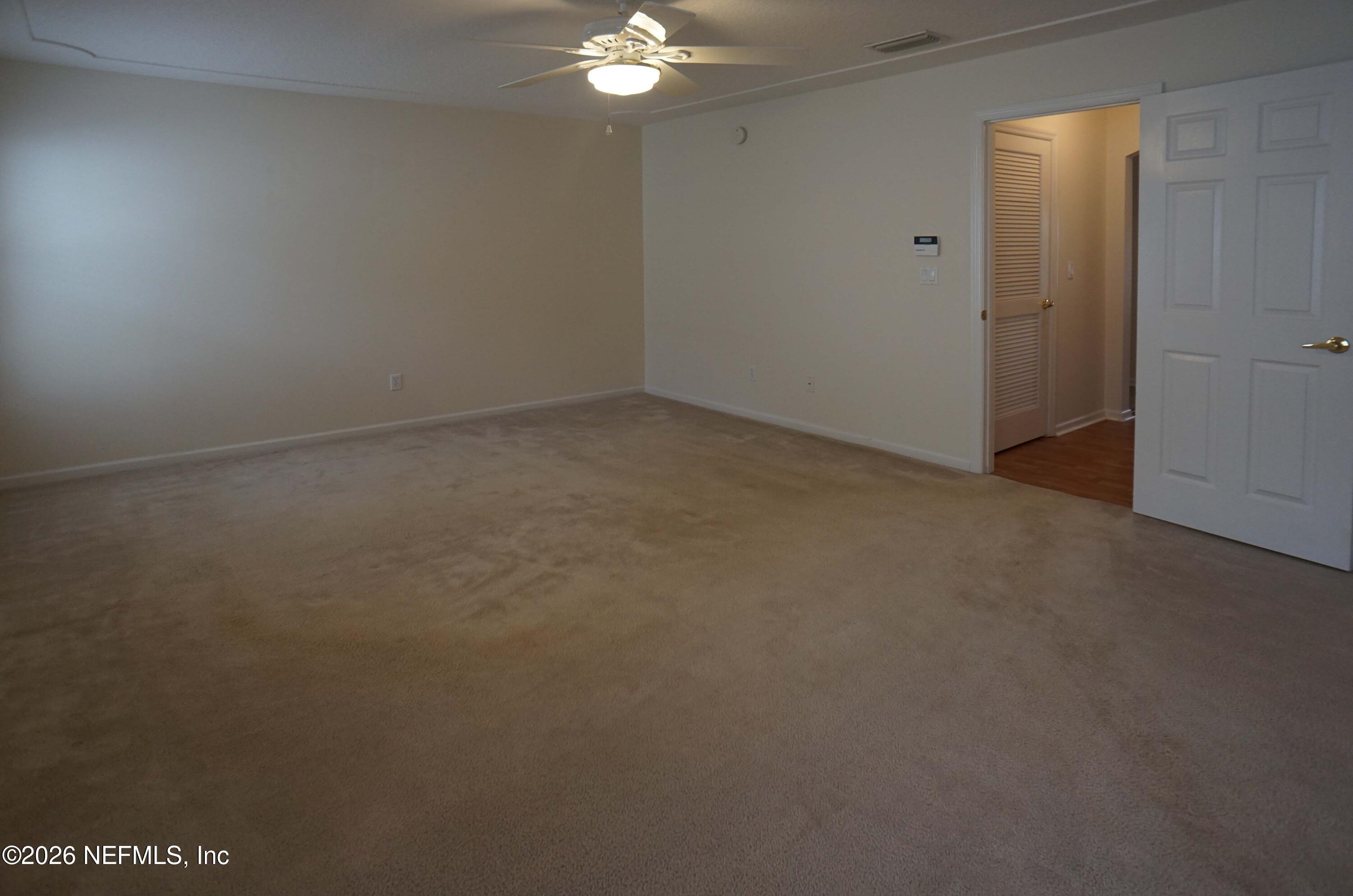 1721 Keswick Road St. Augustine, FL 32084 - Photo 9 of 17 an empty room with a bathroom