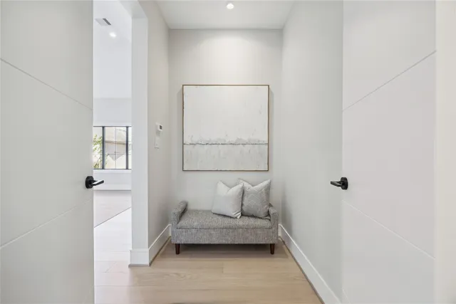 a view of a hallway with entryway