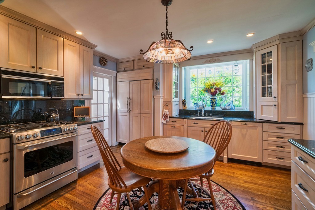 185 Downer Avenue Hingham, MA 02043 - Photo 11 of 30 a view of a dining room with furniture window and wooden floor