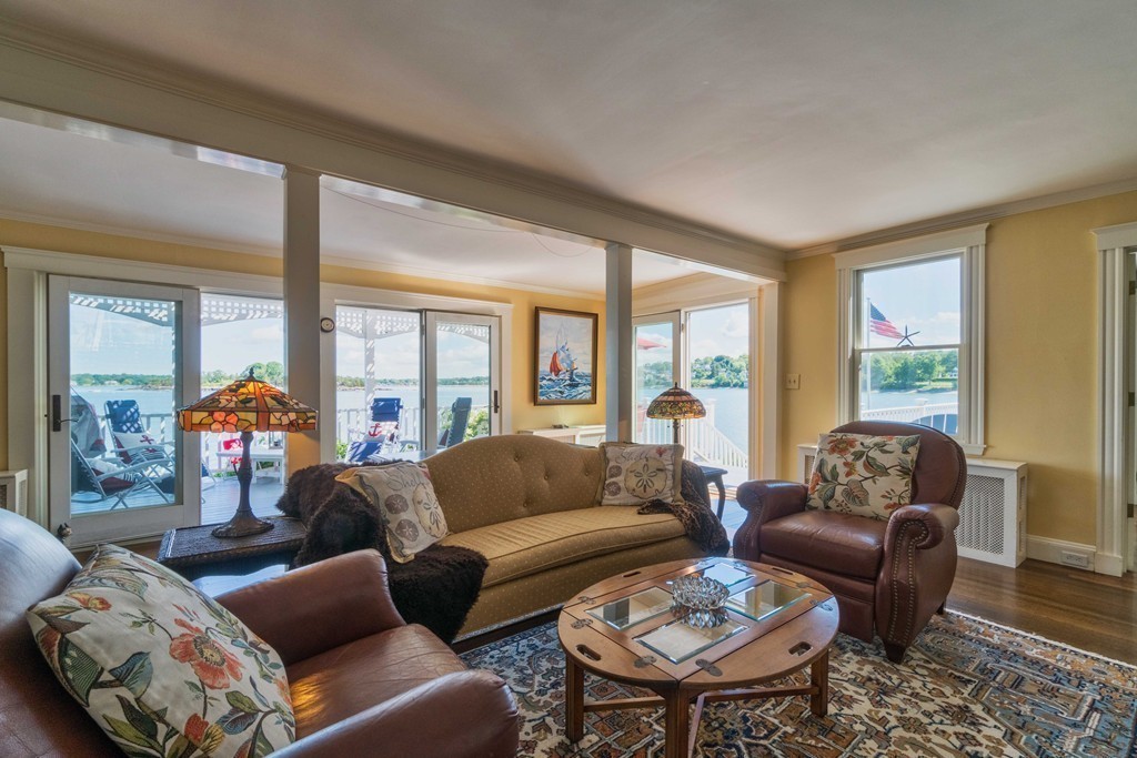 185 Downer Avenue Hingham, MA 02043 - Photo 13 of 30 a living room with furniture and a large window