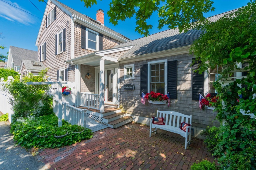 185 Downer Avenue Hingham, MA 02043 - Photo 2 of 30 a front view of a house with yard