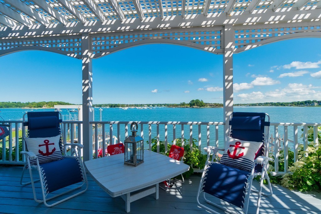 185 Downer Avenue Hingham, MA 02043 - Photo 24 of 30 a living room with furniture and a floor to ceiling window