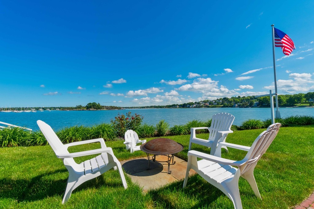 185 Downer Avenue Hingham, MA 02043 - Photo 4 of 30 a balcony with furniture and a garden