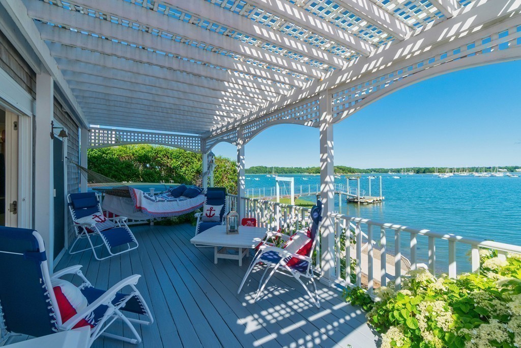 185 Downer Avenue Hingham, MA 02043 - Photo 6 of 30 a view of a patio with chairs and potted plants
