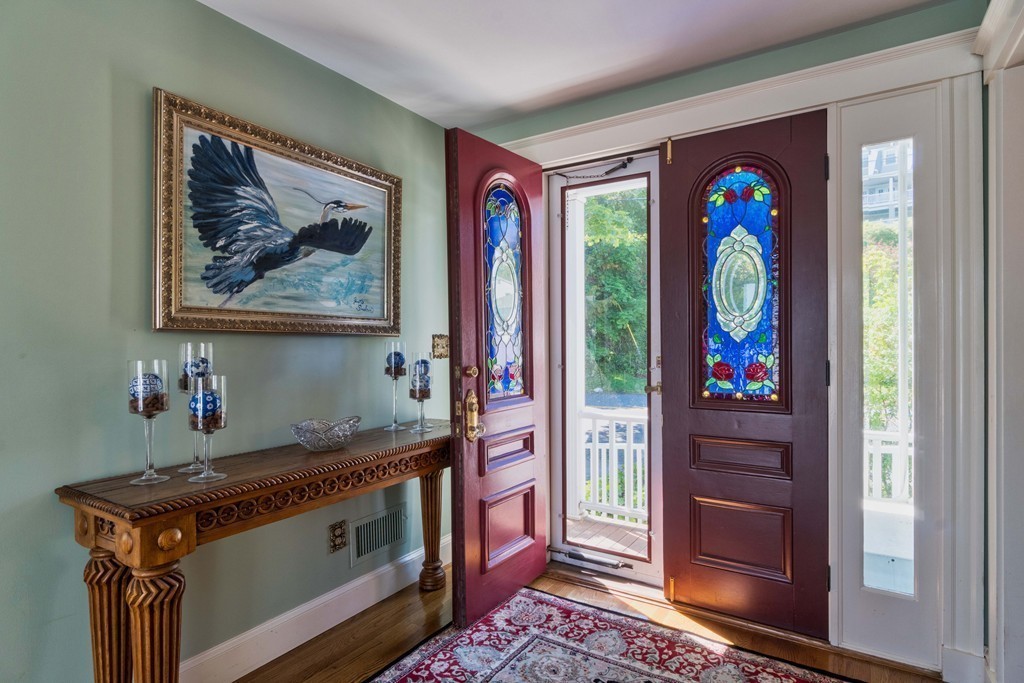 185 Downer Avenue Hingham, MA 02043 - Photo 7 of 30 a view of an entryway with wooden floor