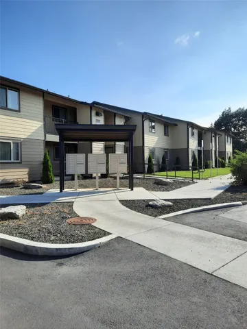 a view of a food mall next to a road