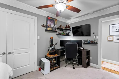 a view of a backyard with a garden and entertaining space