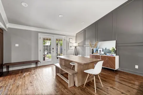 a kitchen with stainless steel appliances granite countertop wooden cabinets sink stove and refrigerator