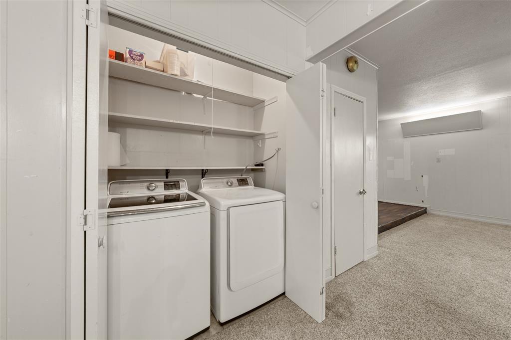 608 West Spring Street West, TX 76691 - Photo 19 of 27 a view of storage and utility room with washer and dryer
