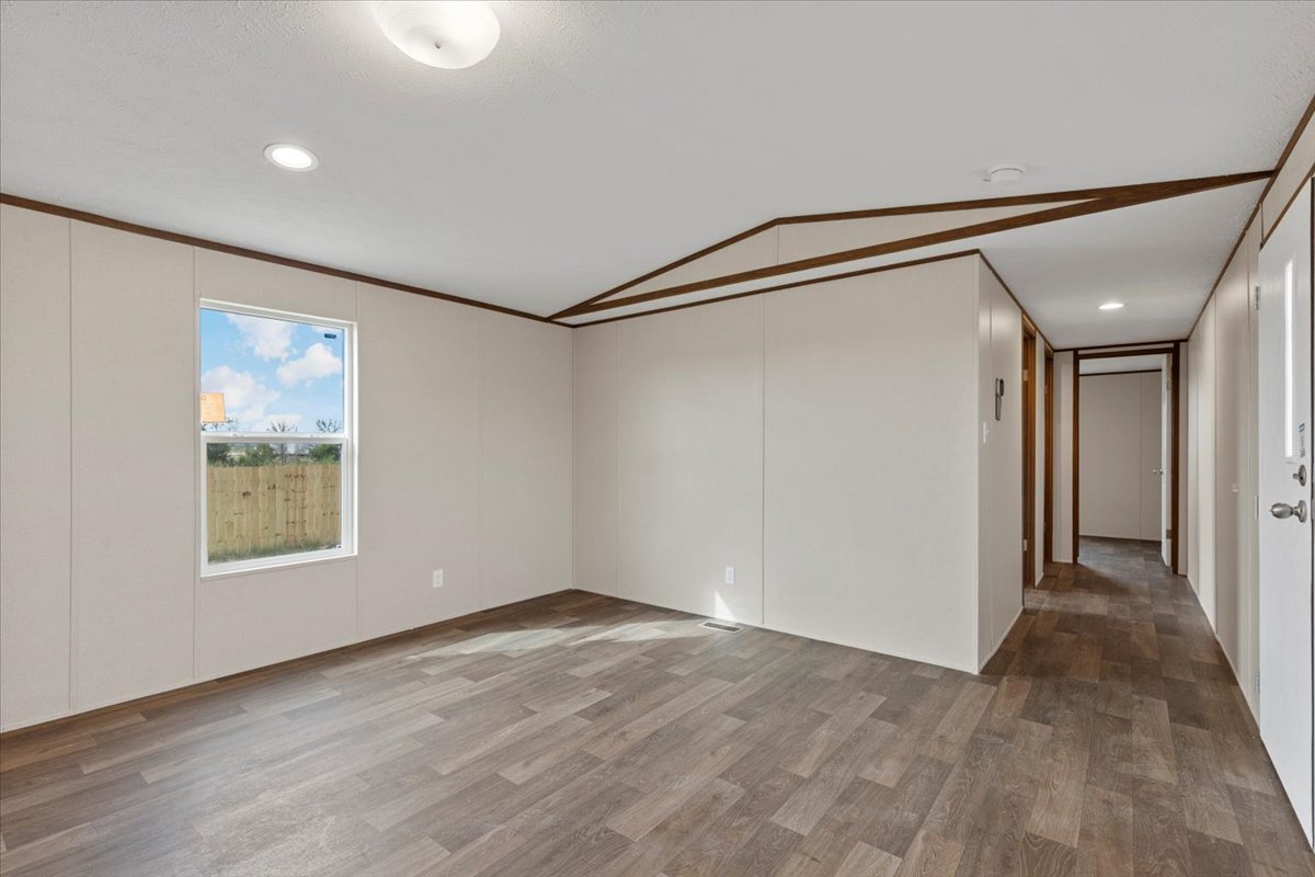 Tbd Williamson Road Kyle, TX 78640 - Photo 22 of 33 a view of a big room with wooden floor and windows