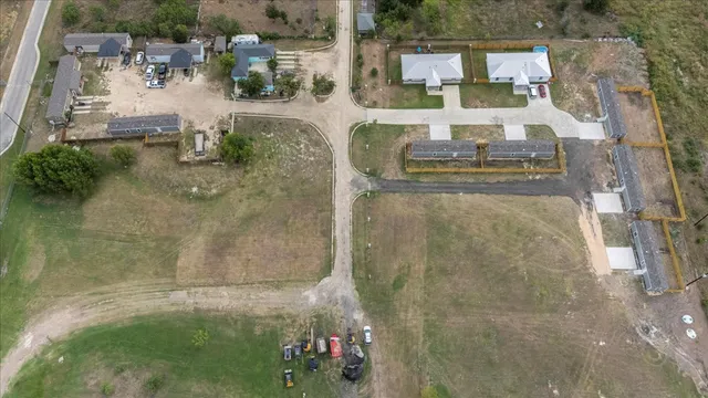 an aerial view of residential house with outdoor space