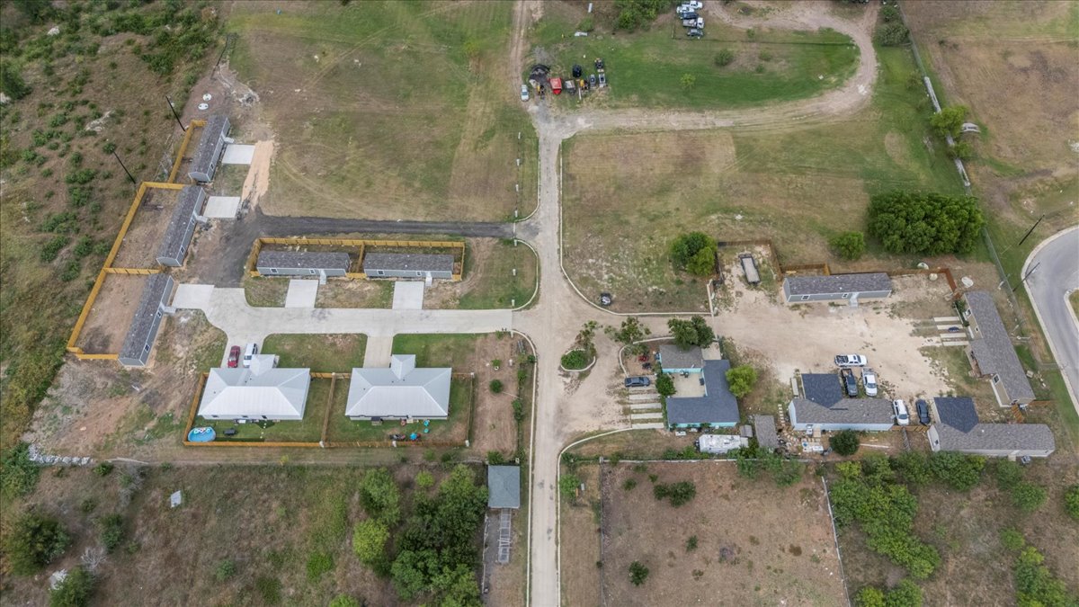 Tbd Williamson Road Kyle, TX 78640 - Photo 8 of 33 an aerial view of residential house with outdoor space and parking