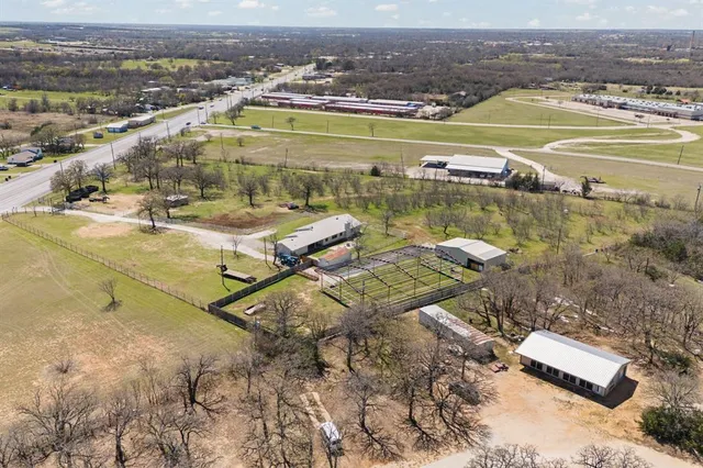 a white building with a close up of a shower