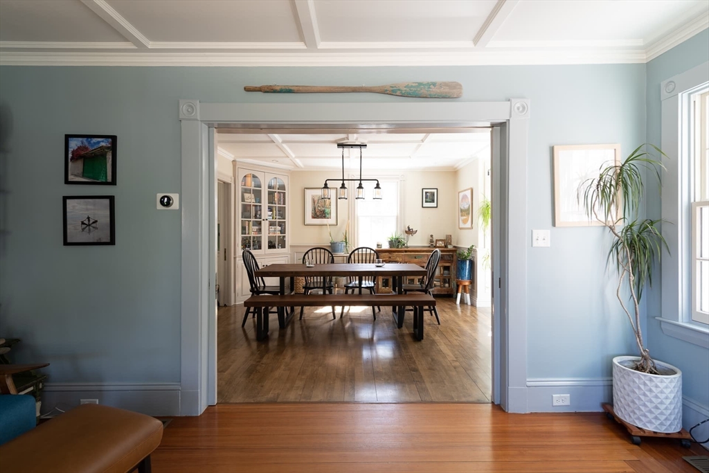 20 Maple Road Weston, MA 02493 - Photo 15 of 42 a view of a dining room with furniture and a potted plant