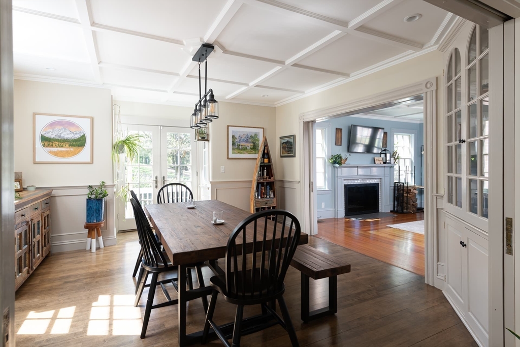 20 Maple Road Weston, MA 02493 - Photo 16 of 42 a view of a dining room with furniture a chandelier and wooden floor