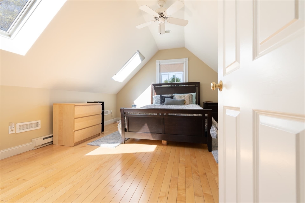 20 Maple Road Weston, MA 02493 - Photo 26 of 42 a living room with furniture and a fireplace
