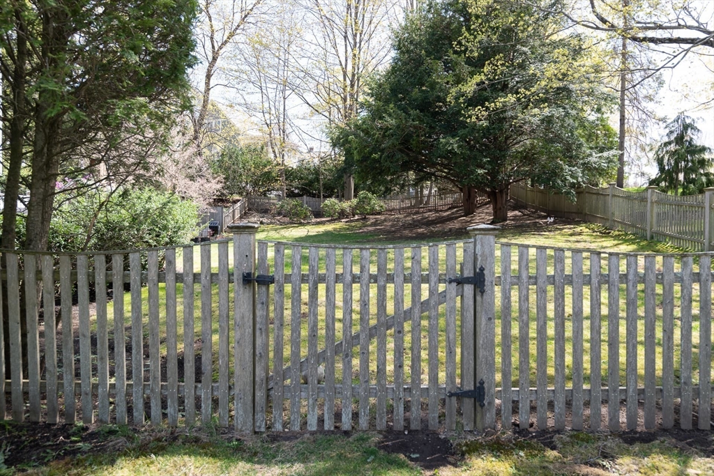 20 Maple Road Weston, MA 02493 - Photo 30 of 42 a balcony with trees in front of it