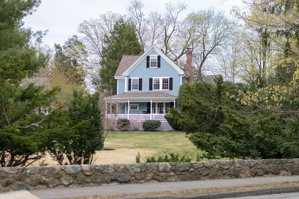 20 Maple Road Weston, MA 02493 - Photo 3 of 42 a front view of a house with a yard