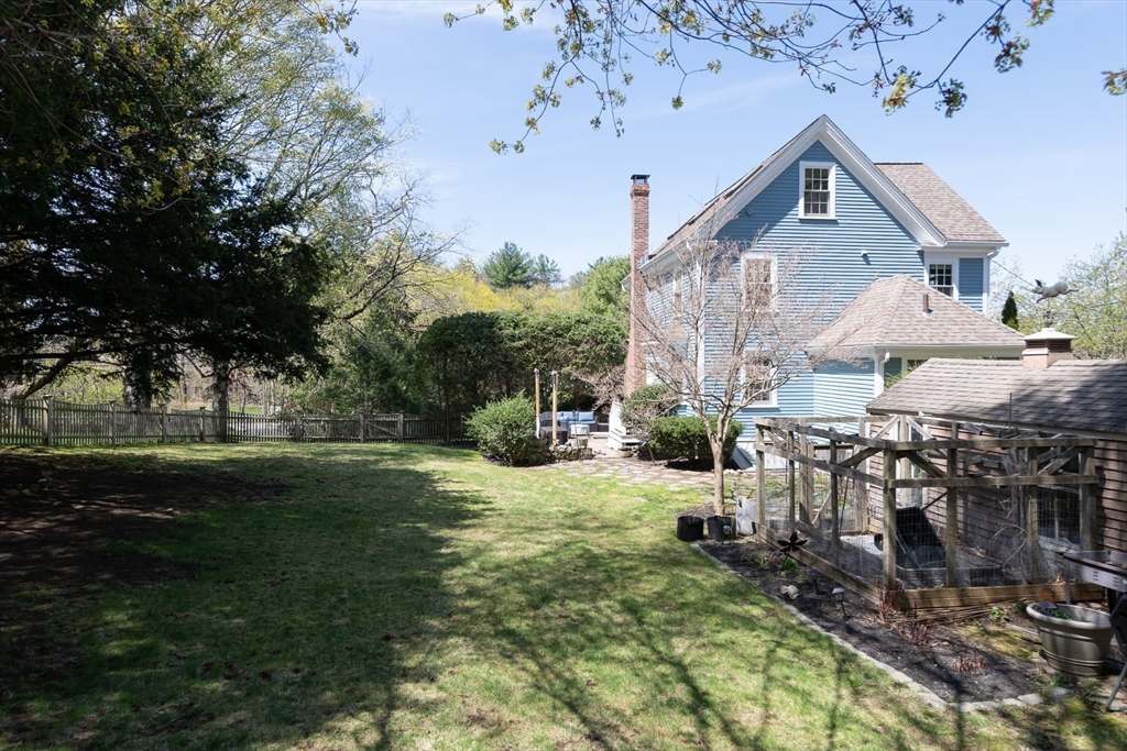 20 Maple Road Weston, MA 02493 - Photo 31 of 42 a view of a house with a yard