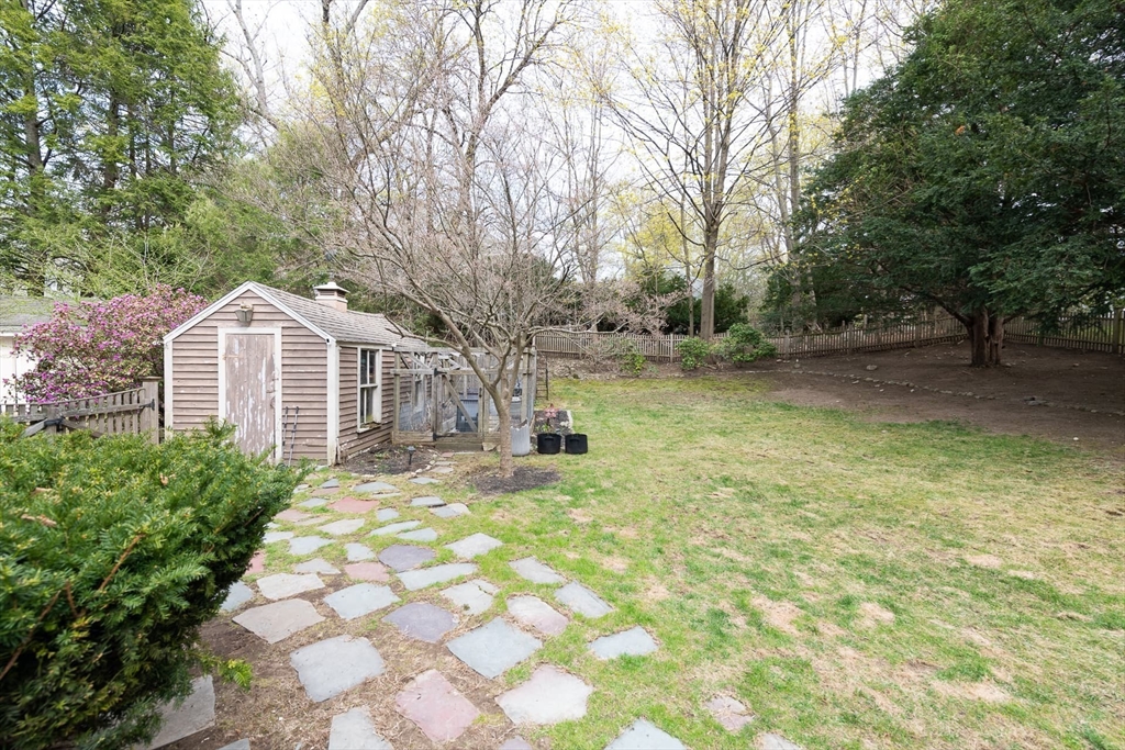 20 Maple Road Weston, MA 02493 - Photo 33 of 42 a front view of a house with a yard