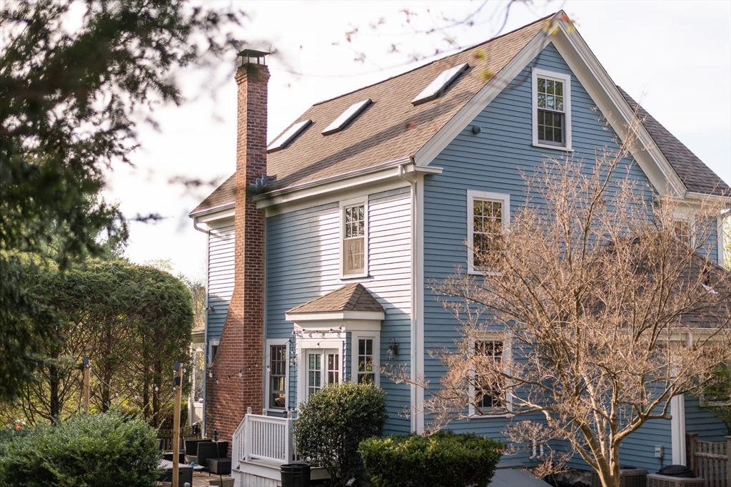 20 Maple Road Weston, MA 02493 - Photo 34 of 42 a front view of a house with a yard
