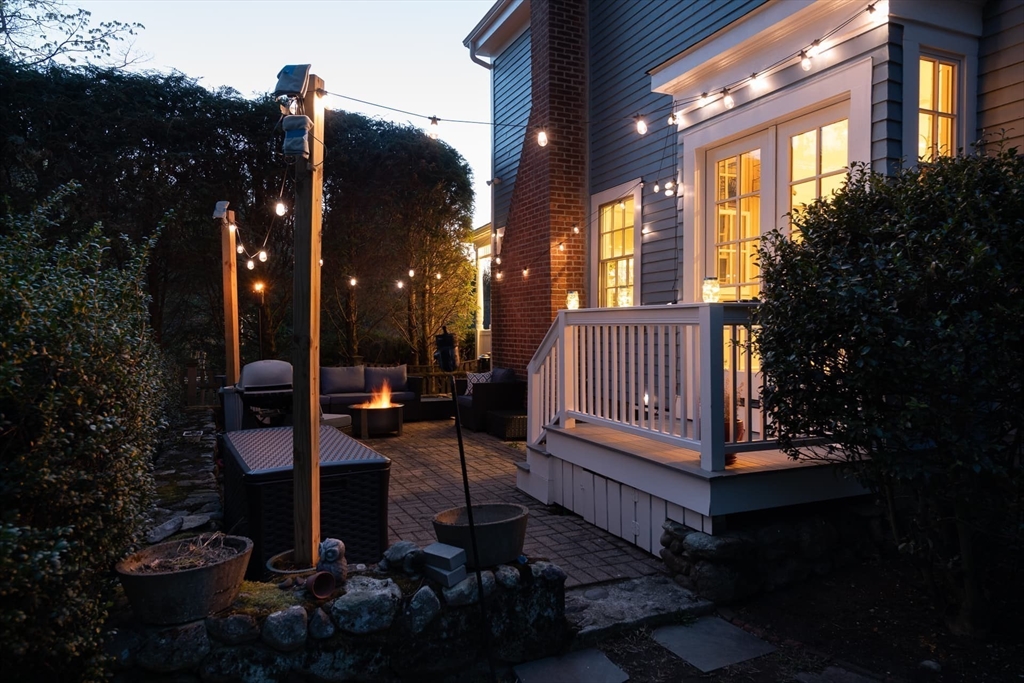 20 Maple Road Weston, MA 02493 - Photo 35 of 42 a view of a house with backyard and porch