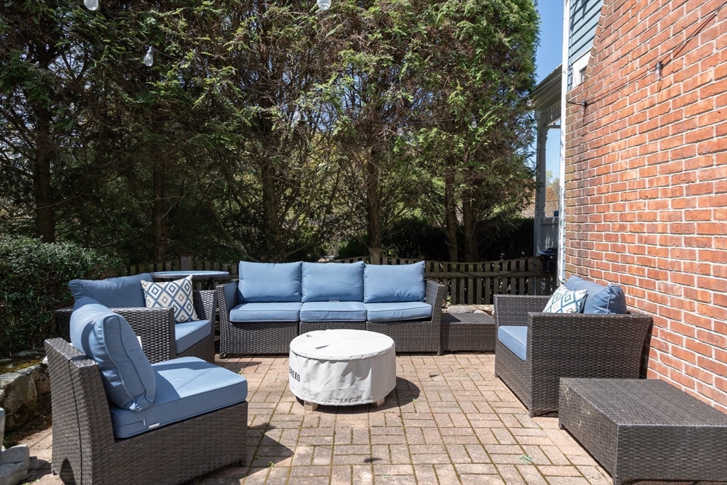 20 Maple Road Weston, MA 02493 - Photo 38 of 42 a building outdoor space with patio furniture