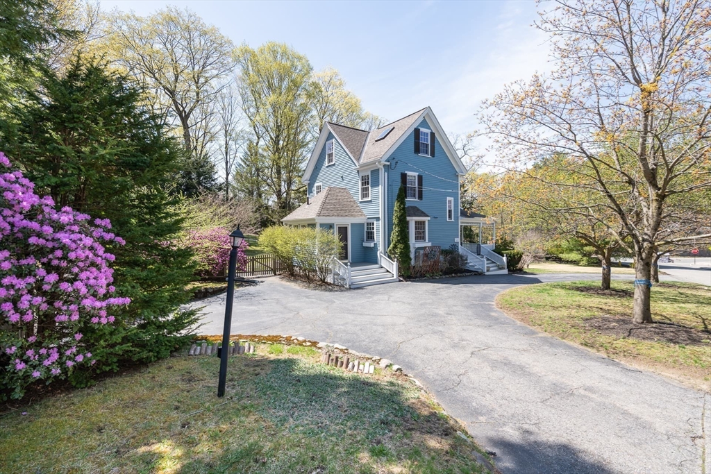 20 Maple Road Weston, MA 02493 - Photo 4 of 42 a front view of a house with a yard and tree s