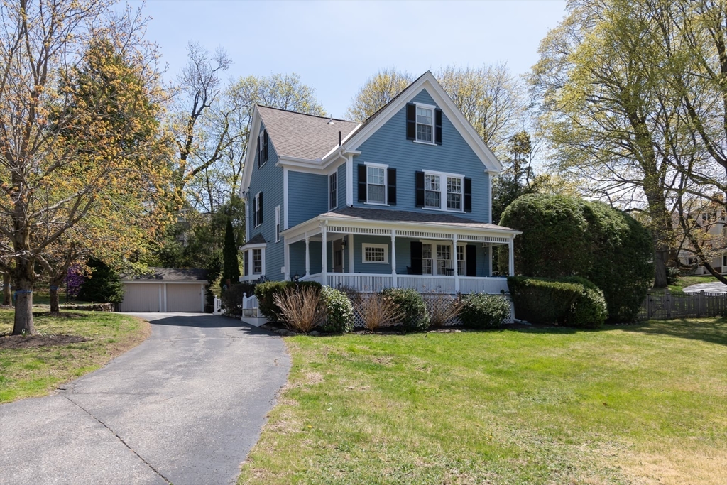 20 Maple Road Weston, MA 02493 - Photo 5 of 42 a front view of a house with a garden