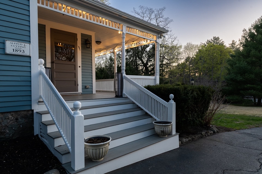 20 Maple Road Weston, MA 02493 - Photo 8 of 42 a view of a porch with furniture and garden