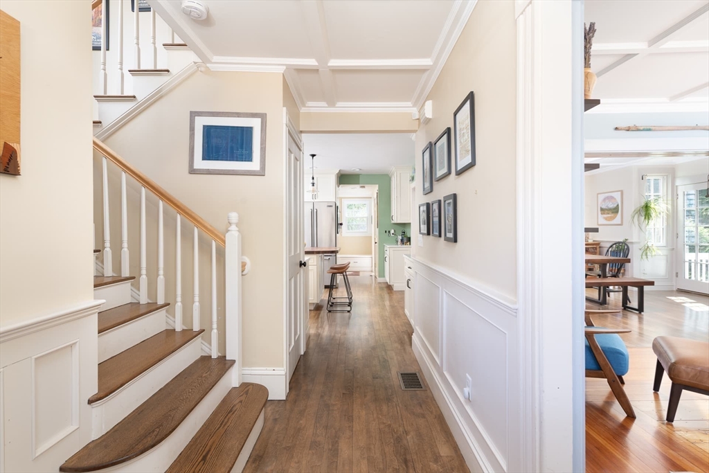 20 Maple Road Weston, MA 02493 - Photo 10 of 42 a view of a hallway with wooden floor and staircase