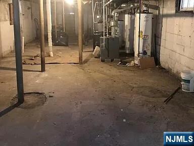 69 Hobson Street Newark, NJ 07112 - Photo 12 of 23 a view of a room with gym equipment