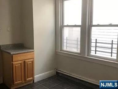 69 Hobson Street Newark, NJ 07112 - Photo 17 of 23 a view of an empty room and a window