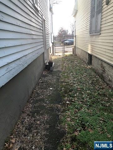69 Hobson Street Newark, NJ 07112 - Photo 21 of 23 a view of a backyard with pathway