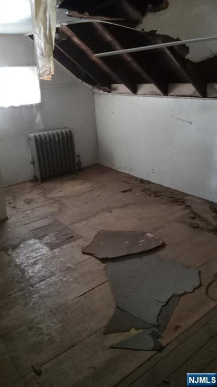 69 Hobson Street Newark, NJ 07112 - Photo 4 of 23 a view of water heater room