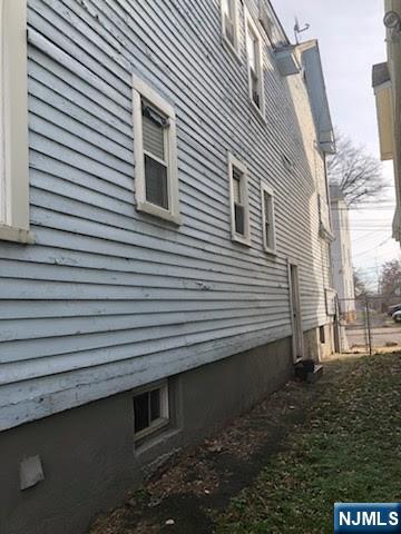 69 Hobson Street Newark, NJ 07112 - Photo 10 of 23 a view of a back yard of the house