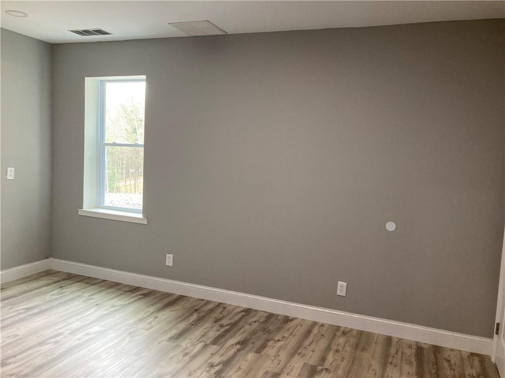 100 B Dickerson Road Dahlonega, GA 30533 - Photo 9 of 11 an empty room with a window