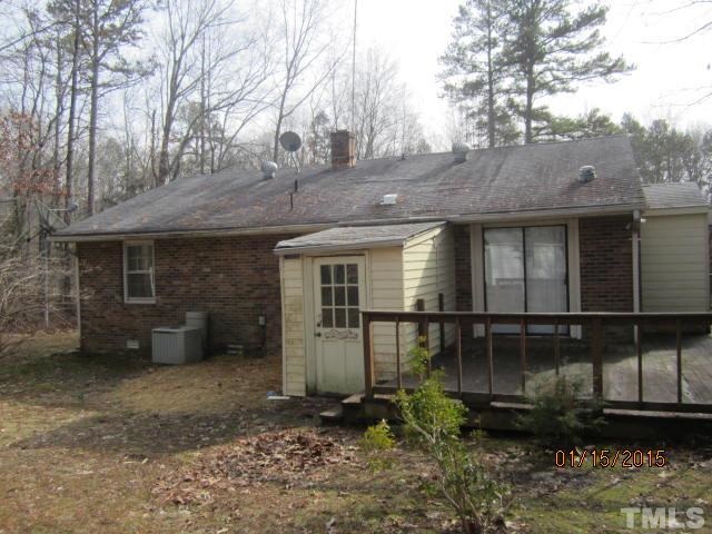 1427 Dirgie Mine Road Roxboro, NC 27574 - Photo 3 of 13 a view of a house with a yard