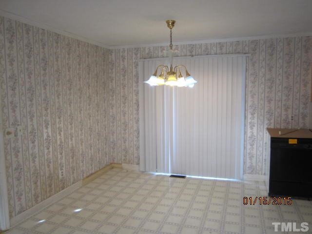1427 Dirgie Mine Road Roxboro, NC 27574 - Photo 6 of 13 a view of an empty room with window