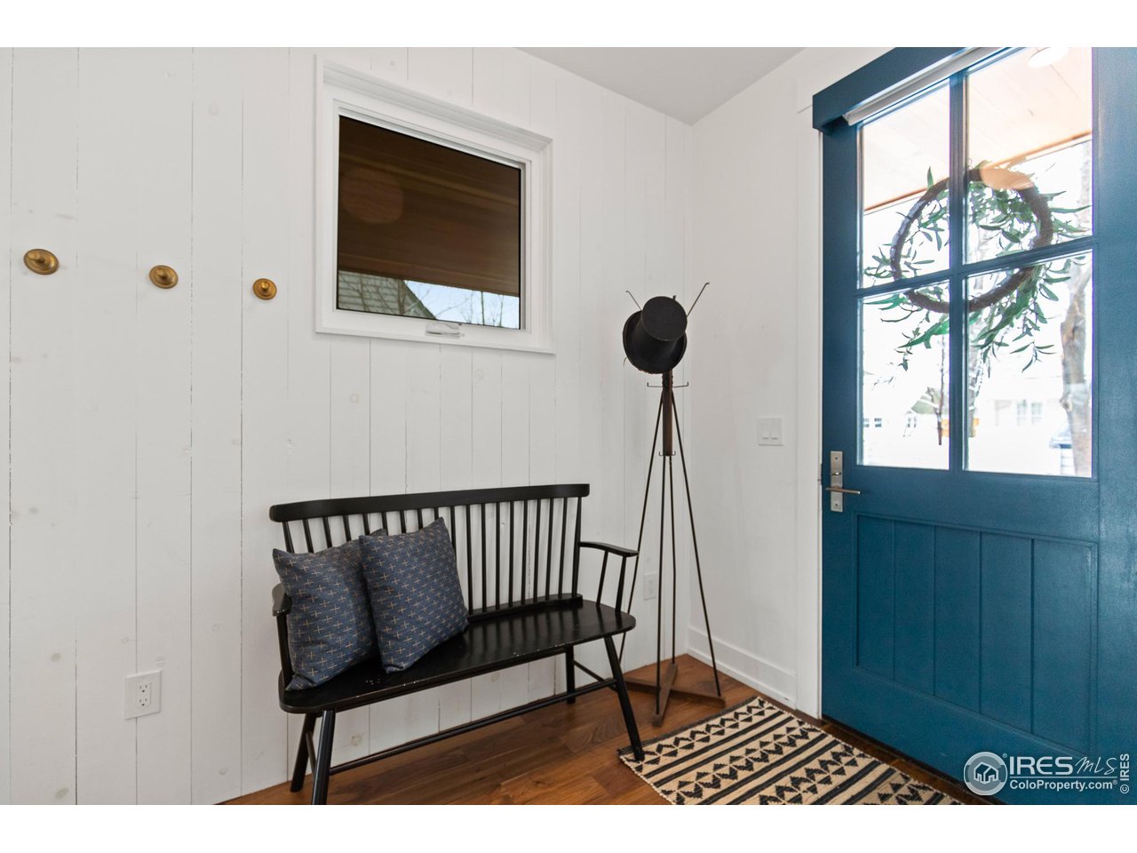 3184 9th Street Boulder, CO 80304 - Photo 13 of 39 a view of entryway with a window and wooden floor