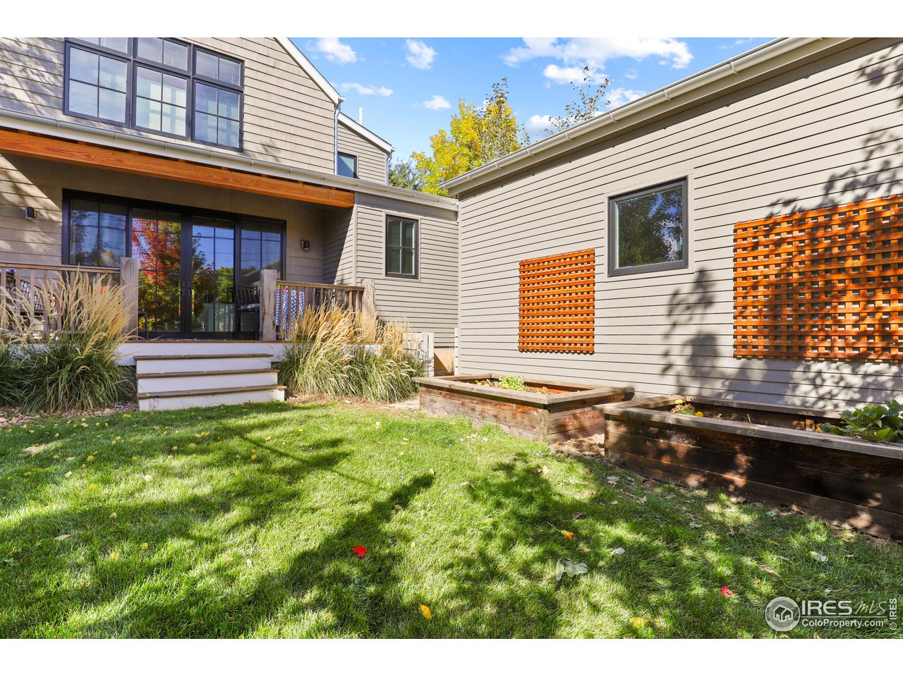 3184 9th Street Boulder, CO 80304 - Photo 20 of 39 a front view of a house with garden