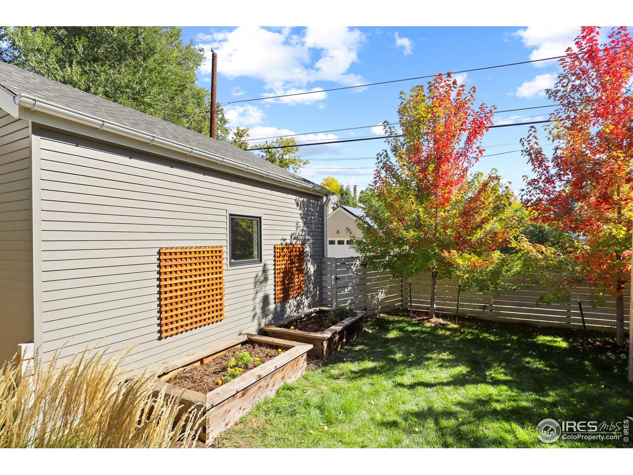 3184 9th Street Boulder, CO 80304 - Photo 21 of 39 a view of backyard with a small cabin