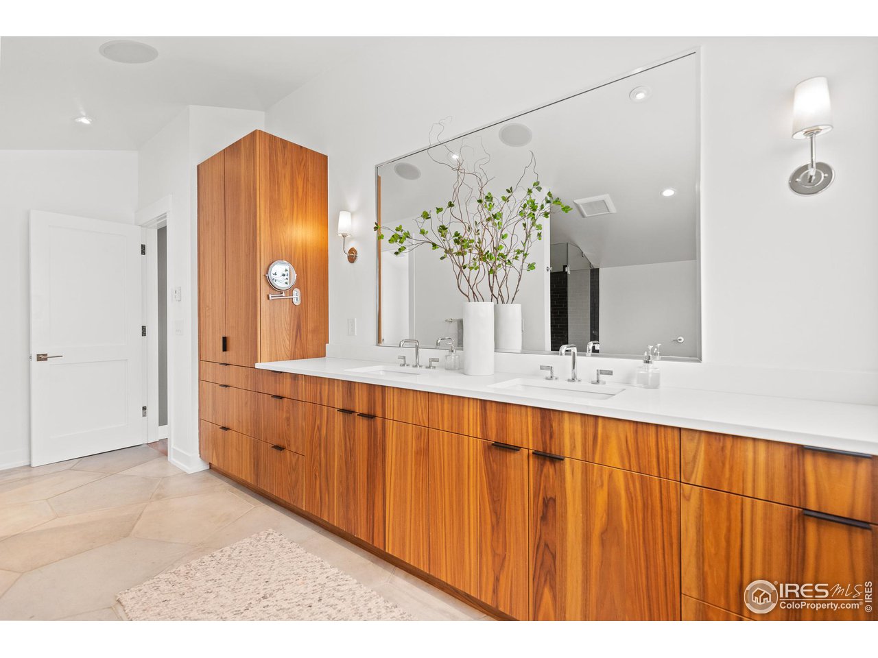 3184 9th Street Boulder, CO 80304 - Photo 26 of 39 a bathroom with a double vanity sink and a mirror